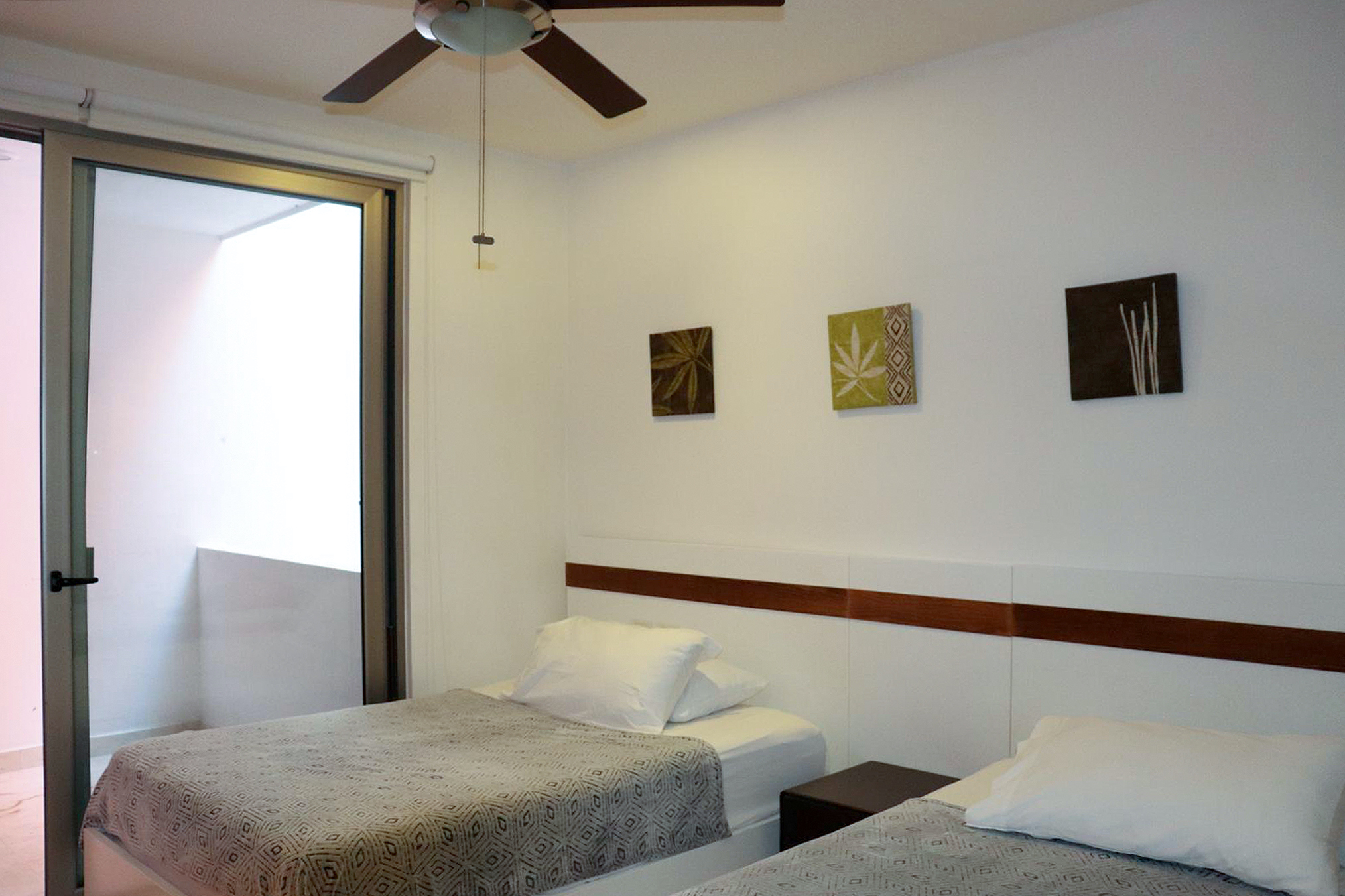 2 BR Studio One Condo — S1-202 - Bedroom 2 - 2 Double Beds + TV + Balcony