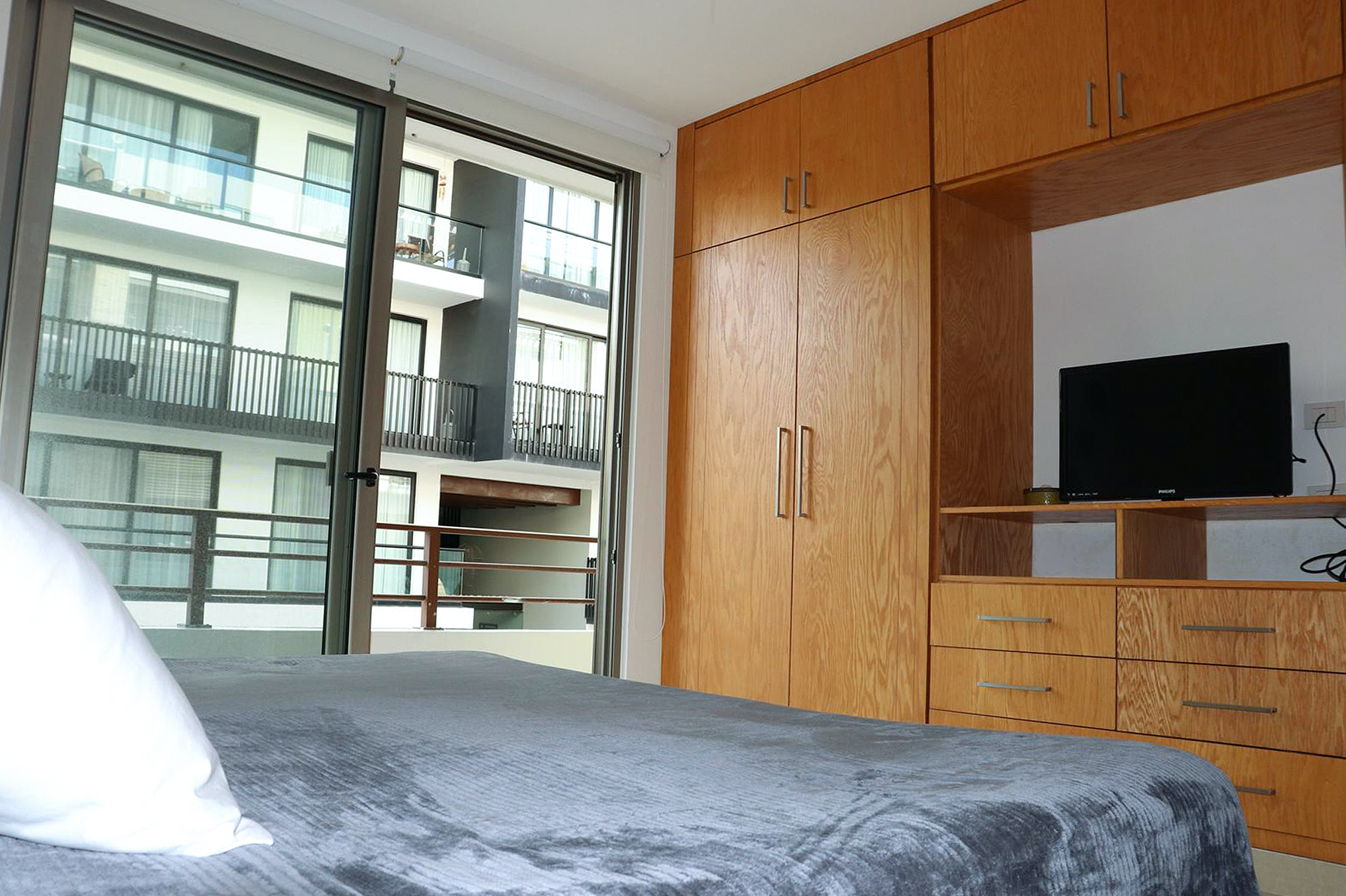 2 BR Studio One Condo — S1-202 - Bedroom 1 - King Bed + TV + Balcony