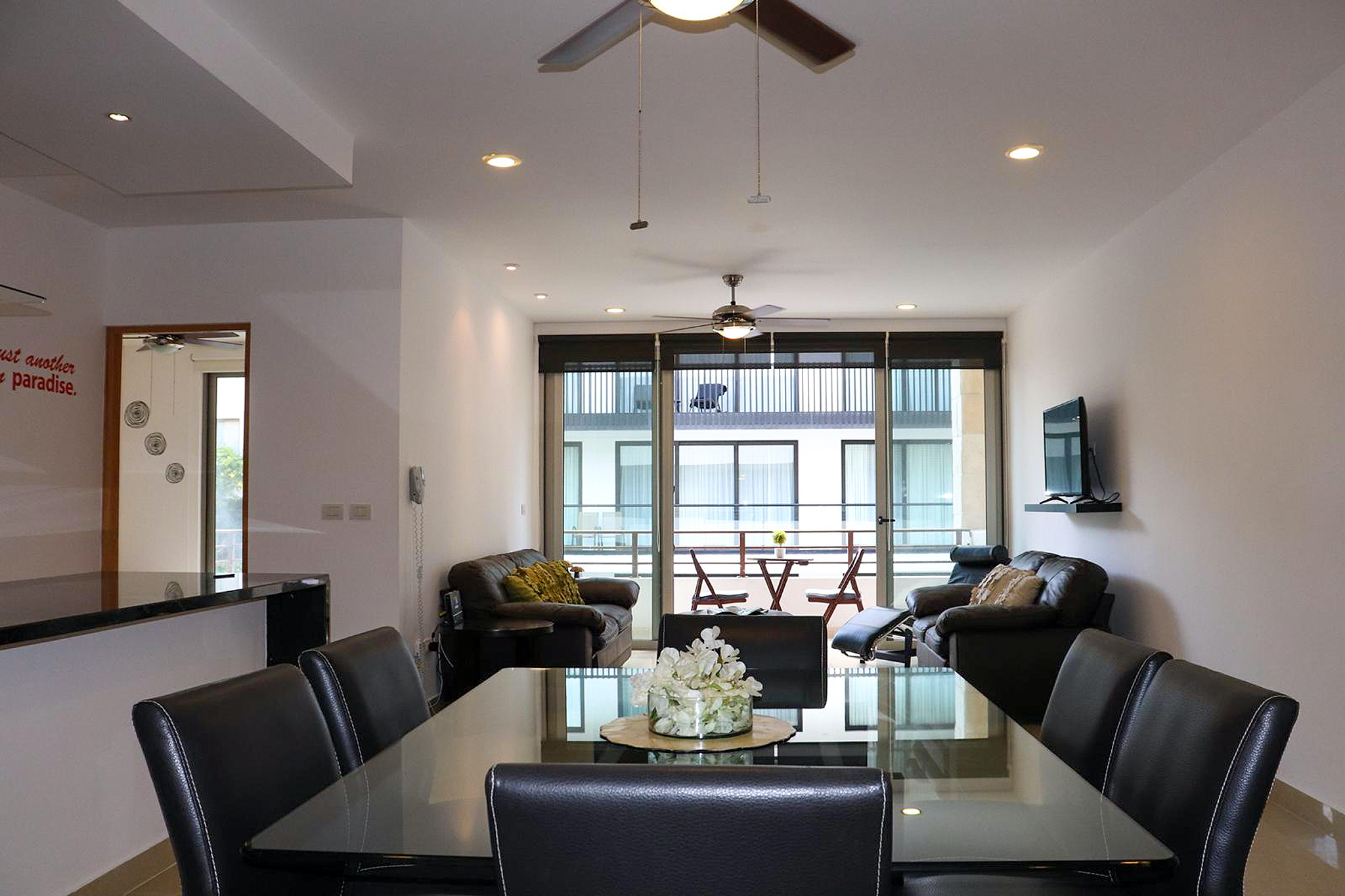 2 BR Studio One Condo — S1-202 - Interior - Dining Room + Living Room