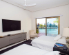3 BR Novo Cancun Villa - Bedroom 3 - 2 Double Beds + Curved TV + Balcony